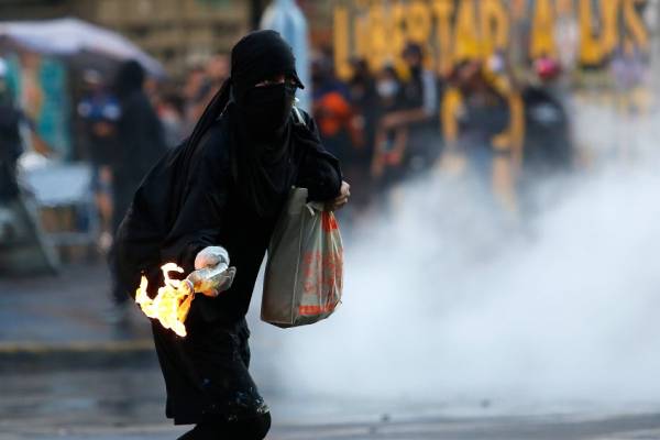 Cárcel a quienes porten combustibles en protestas